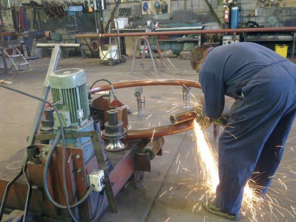 Grinding sparks on a pipe rolling job