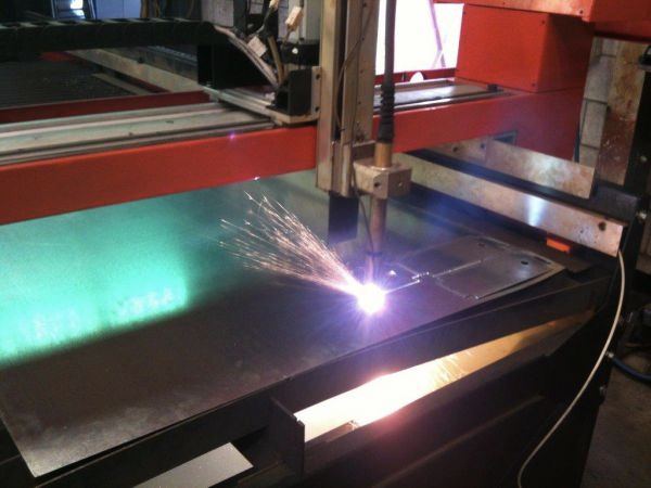 CNC plasma cutter mid-cut